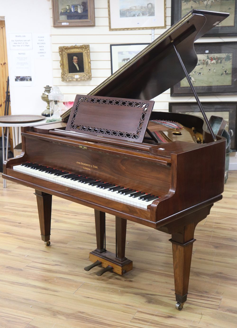A John Broadwood rosewood baby grand piano and stool